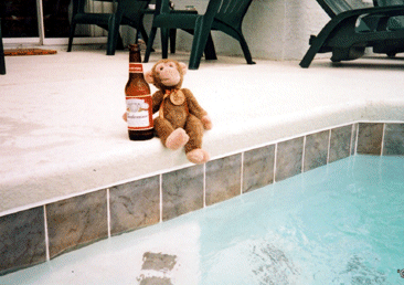 Jimby and a bottle of Bud at the pool