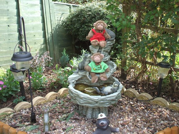 Twins with the Otter Fountain